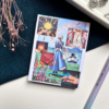 A7 Howl's Moving Castle Studio Ghibli tear-off memopad with illustrated cover art featuring the whimsical walking castle, placed on a warm aesthetic desk surface
