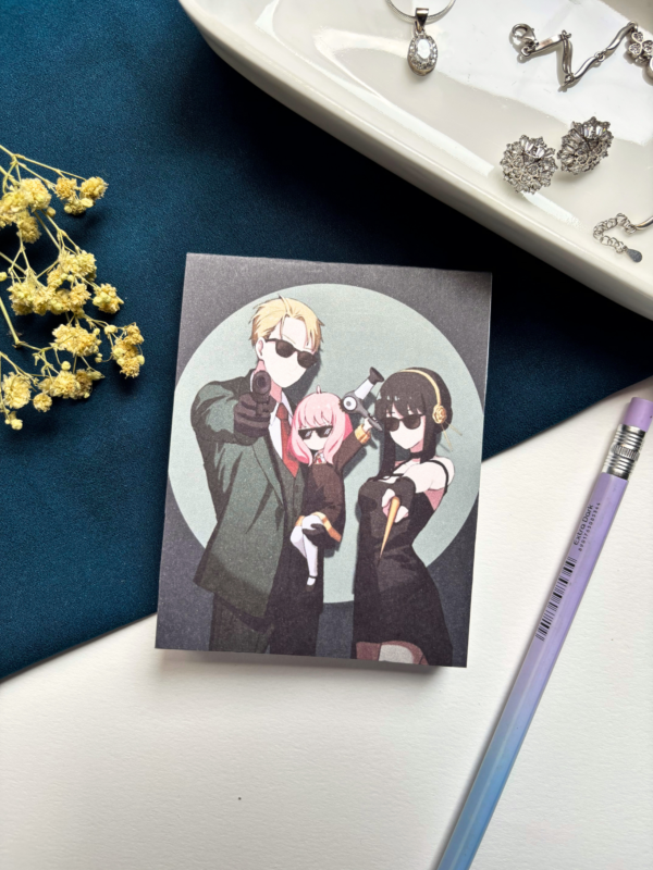 A7 Howl's Moving Castle Studio Ghibli tear-off memopad with illustrated cover art featuring the whimsical walking castle, placed on a warm aesthetic desk surface