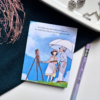 A7 Studio Ghibli The Wind Rises tear-off memopad with illustrated cover art showing a dreamy sky scene, placed on a light aesthetic desk surface
