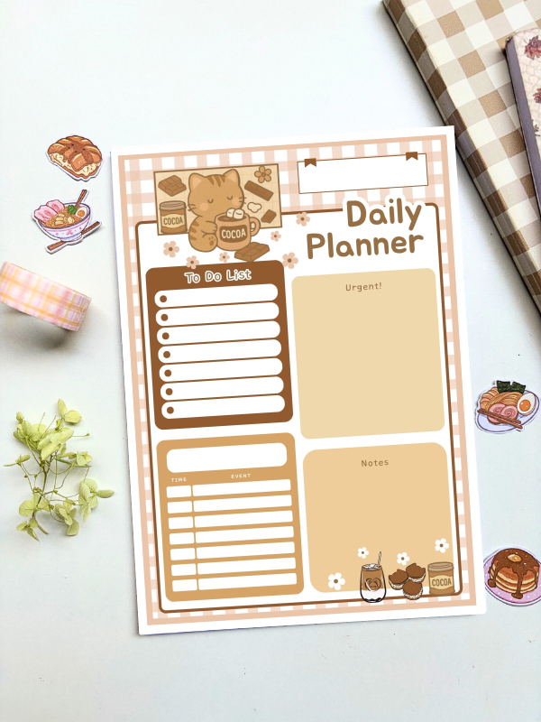 A5 daily planner with a pink gingham border featuring a cocoa kitten illustration, including sections for to-do list, urgent tasks, time/event schedule, and notes.