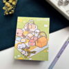 A7 memopad with a cute kitten summer picnic illustrated cover.