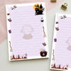 Lined notepad with a lavender background featuring a crystal ball, bats, spider, tarot cards, potion bottles, broomsticks, a cauldron, a haunted house, and a graveyard.