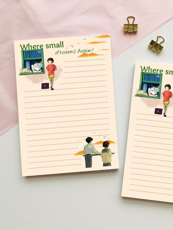 Lined notepad titled "Where small dreams begin!" featuring illustrated scenes inspired by Whisper of the Heart, including a girl by a window with a sleeping cat and two figures watching a sunset.