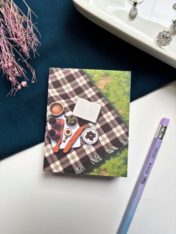 A7 memopad with a cozy picnic-themed illustrated cover.