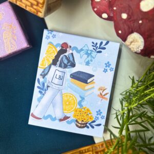 Modern girl memopad featuring an illustrated girl with a tote bag, books, flowers, and lemons, aesthetic lifestyle-themed notepad design.