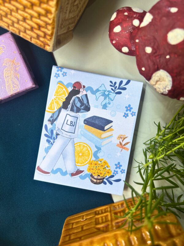 Modern girl memopad featuring an illustrated girl with a tote bag, books, flowers, and lemons, aesthetic lifestyle-themed notepad design.