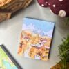 Blue and yellow bear village memopad featuring an illustrated scene of bears in a cozy village, aesthetic storybook-style notepad design.
