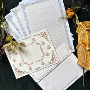 Once Upon a Time vintage letter set with 4 printed letter sheets and 2 matching printed envelopes featuring ornate gold crests and fairy tale-inspired baroque details.