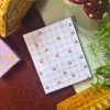 Cherry checkered memopad featuring cute cherry illustrations on a checkered pattern background, aesthetic retro-inspired notepad design.
