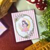 Moonfairy memopad featuring a pastel pink illustration of a fairy girl sitting on a crescent moon, aesthetic celestial-themed notepad design.