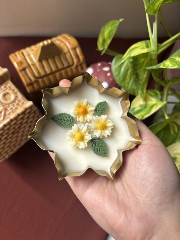 Handcrafted 3.5-inch lotus urli candle with detailed lotus petals in a small traditional urli bowl, glowing softly