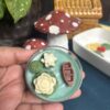 jumbo lotus tealight candle with detailed petals, glowing softly